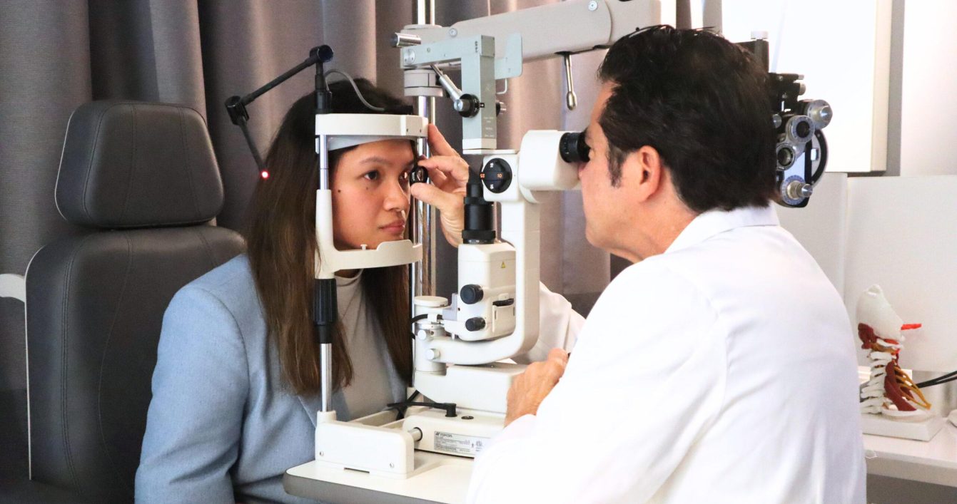 Dr Ciliberti, neuroopthalmologist with Concussion patient who has eye problems